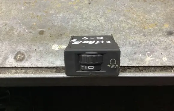 Headlight level height control switch