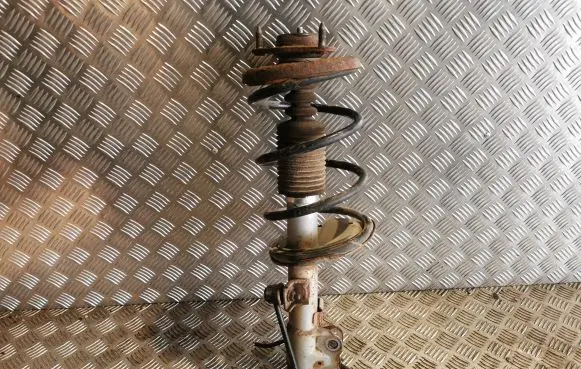 Mitsubishi Lancer X Front shock absorber with coil spring