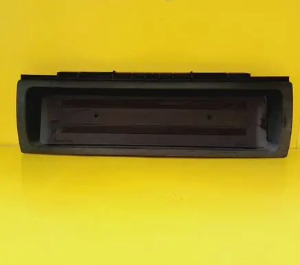 Trunk door license plate light bar
