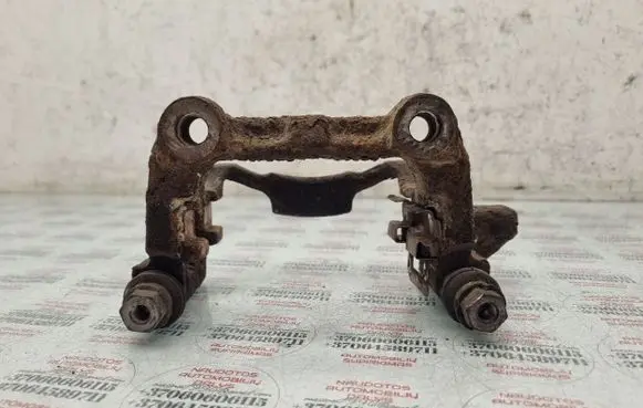 Volkswagen Golf V Brake caliper pad carrier rear 