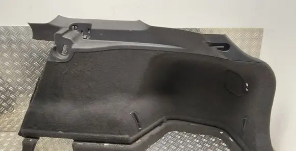 Trunk/boot lower side trim panel