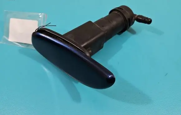 Headlight washer spray nozzle