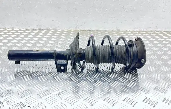 Volkswagen Golf VII Front shock absorber with coil spring 5Q0413023H 5Q0412014MD