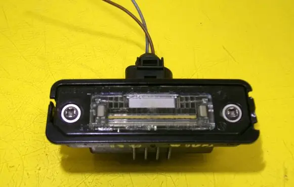 Volkswagen Polo IV 9N3 Number plate light 1J6943021B