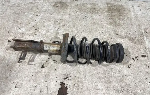 Opel Astra J Front shock absorber with coil spring 13412612