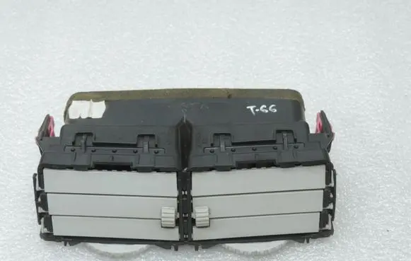 Toyota Yaris Dash center air vent grill 556700D010B0