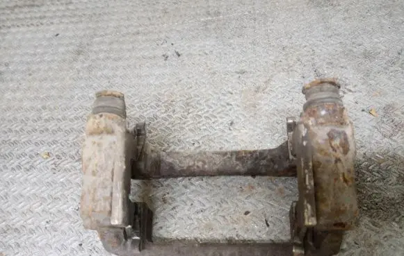 Mazda CX-7 Brake caliper pad carrier rear 