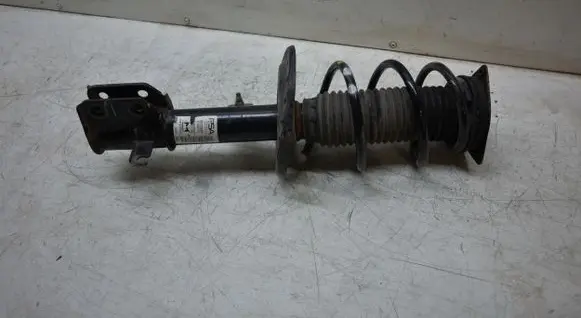 Peugeot 208 Front shock absorber with coil spring 9831168380