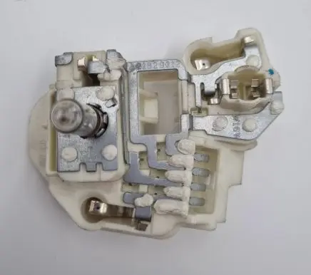 Tail light bulb cover holder