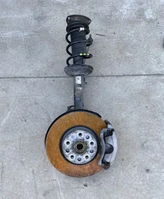 Volkswagen Tiguan Front shock absorber/damper 5Q0407258A