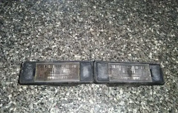 Nissan Primera Number plate light 2KA008224