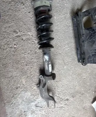 Front shock absorber with coil spring