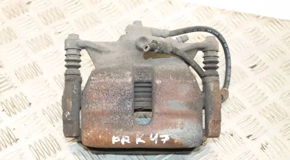 Volkswagen Golf VII Front brake caliper