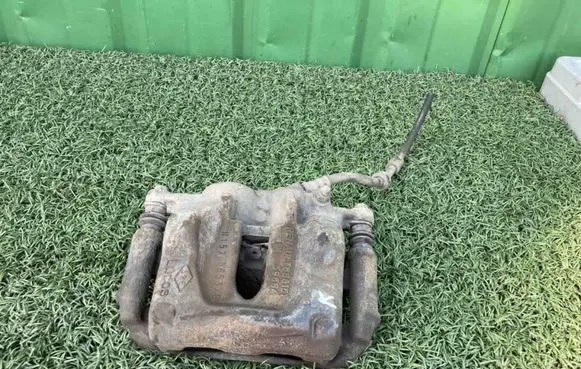 Renault Trafic II (X83) Front brake caliper 7711135701