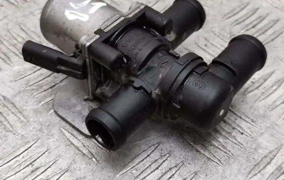 Coolant heater control valve