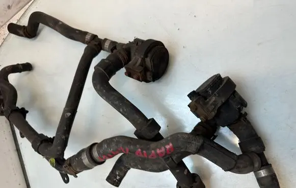 Skoda Rapid (NH) Engine coolant pipe/hose 04B121065A