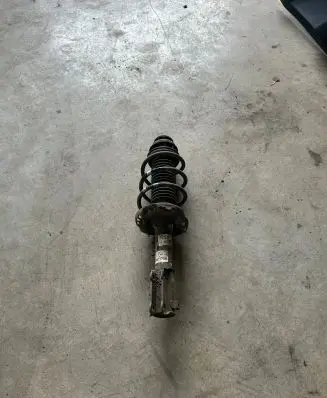 KIA Stonic Front shock absorber with coil spring 54660H8600