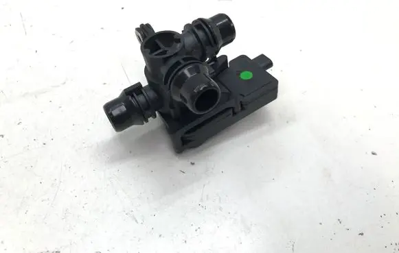 Coolant heater control valve