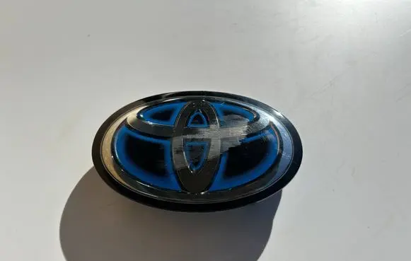 Toyota Corolla E210 E21 Manufacturer badge logo/emblem 9097502124 K765T15