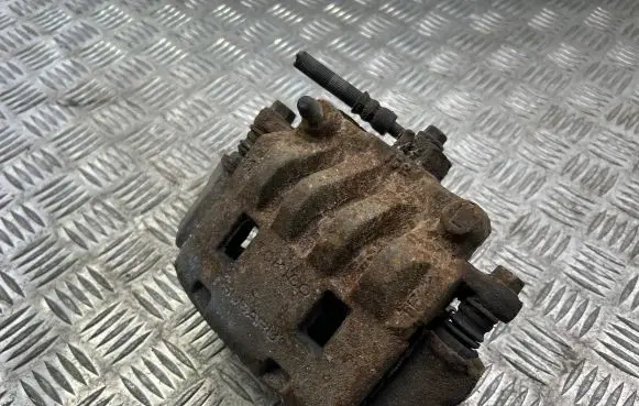 Subaru Impreza III Front brake caliper