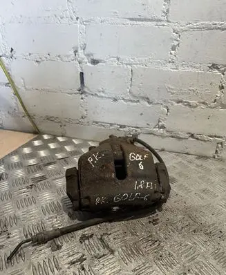 Volkswagen Golf VI Front brake caliper