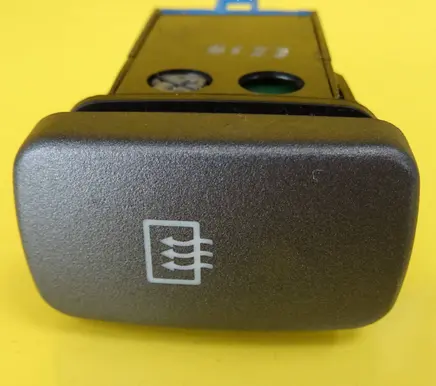 KIA Carens I Windscreen/window heater switch