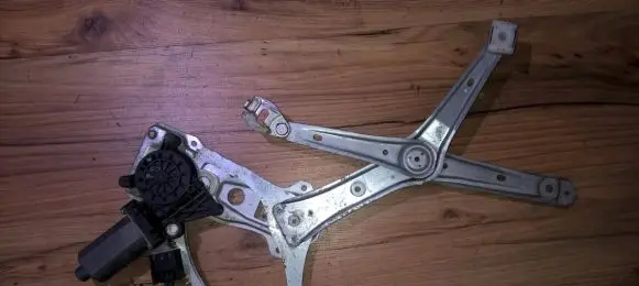 Sliding door window regulator with motor