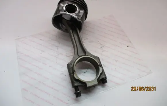 Piston with connecting rod