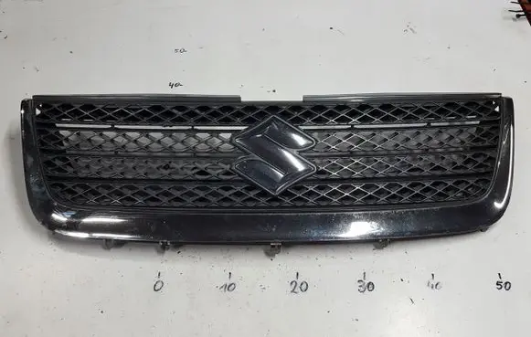 Suzuki Grand Vitara II Front bumper upper radiator grill