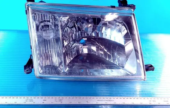 Toyota Land Cruiser (J100) Headlight/headlamp 8101960072