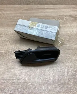 Volkswagen Caddy Front door interior handle 2K0837113B