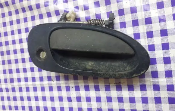 Mazda 323 F Front door exterior handle