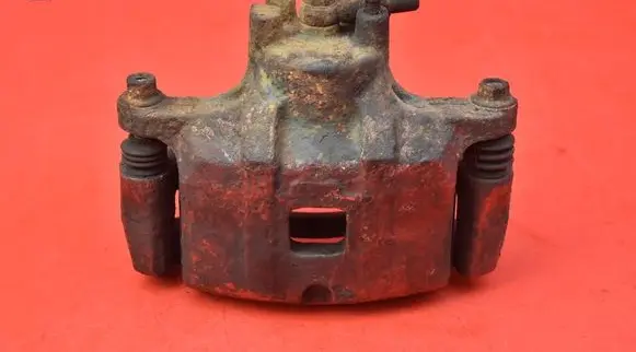 Mitsubishi Lancer VIII Front brake caliper