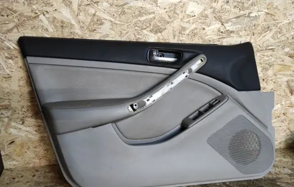 Infiniti G35 Front door card panel trim 80911AM601