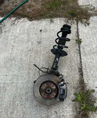 Dacia Sandero III Front shock absorber with coil spring 543028508R