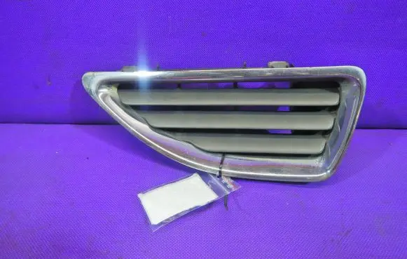 Renault Megane I Front bumper upper radiator grill 7700428964