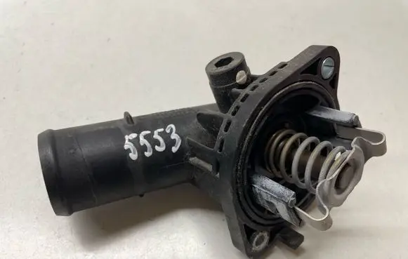 Thermostat/thermostat housing