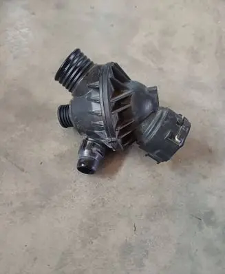 Thermostat/thermostat housing