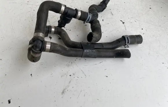 Volkswagen Golf VII Engine coolant pipe/hose 5Q0121049AT
