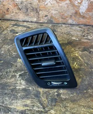 Dash center air vent grill