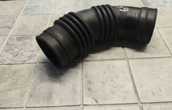 Suzuki Liana Air intake duct part 1376673J00