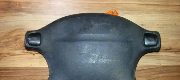Mazda 323 Steering wheel airbag T93013A