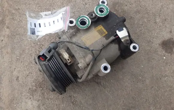Ford Focus Air conditioning (A/C) compressor (pump) YS4H19D629AB