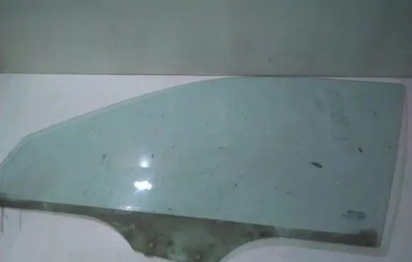 Mazda 323 F Front door window glass four-door