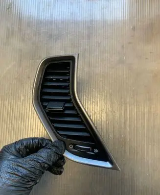 Hyundai Santa Fe Dash center air vent grill 974102W000