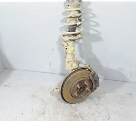 Front shock absorber with coil spring
