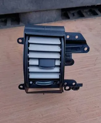 Jaguar XF Dash center air vent grill 8X2319K617BJ