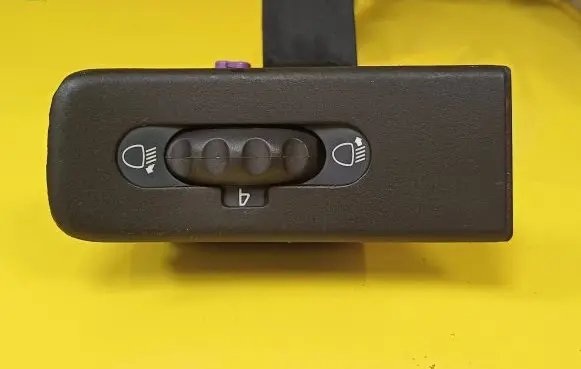 Headlight level height control switch