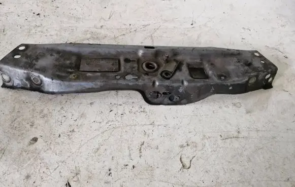 Top upper radiator support slam panel