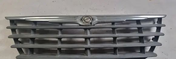 Chrysler Voyager Front bumper upper radiator grill 04857960AA 27169B